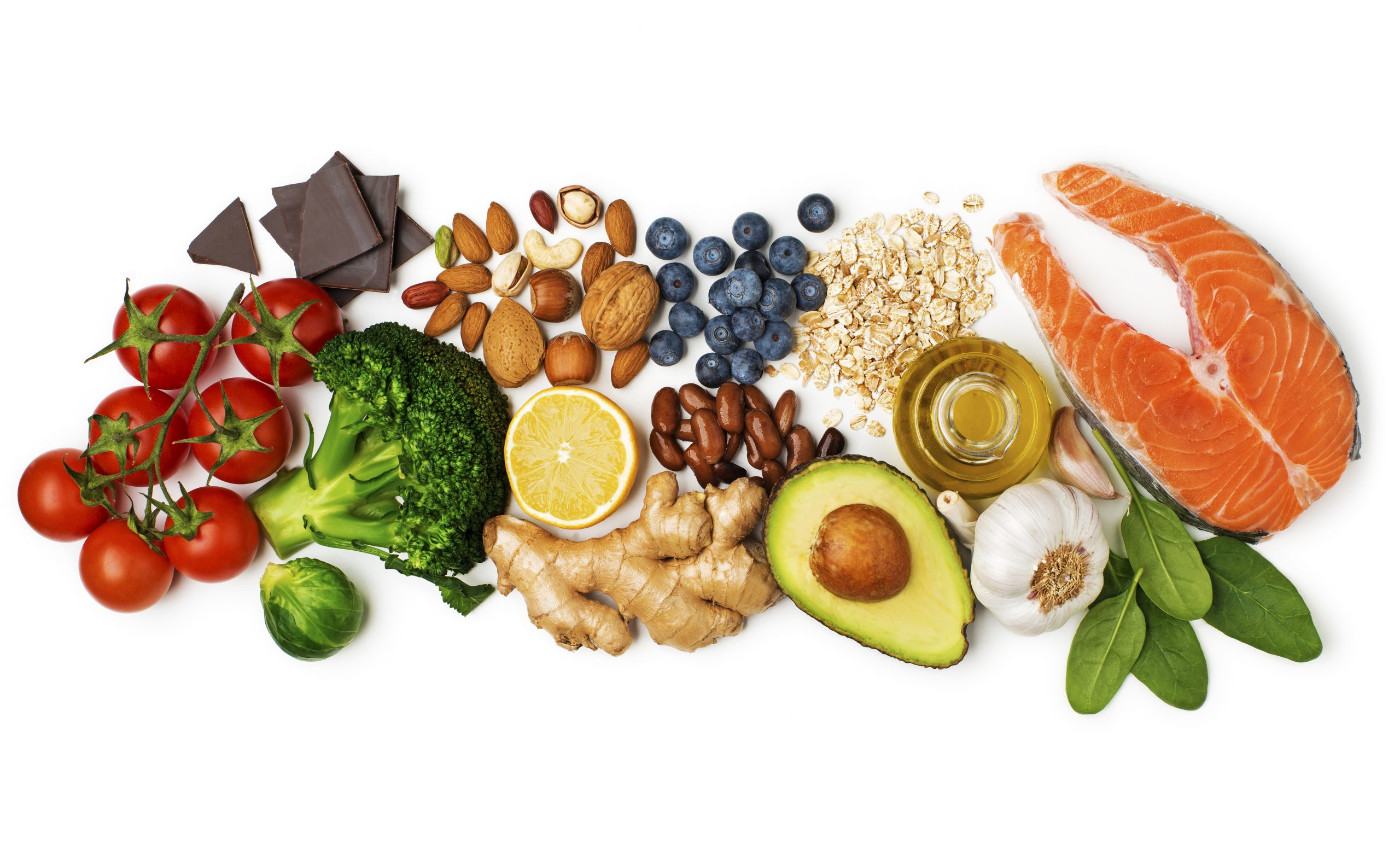 Healthy food with salmon fish Selection of healthy food on white background. Healthy diet foods for heart cholesterol and diabetes.